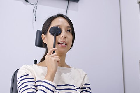 Woman at eye doctor